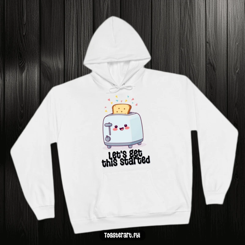 Funny hoodie showcasing a happy toaster character ejecting toast with confetti, offering cozy celebration and humor.