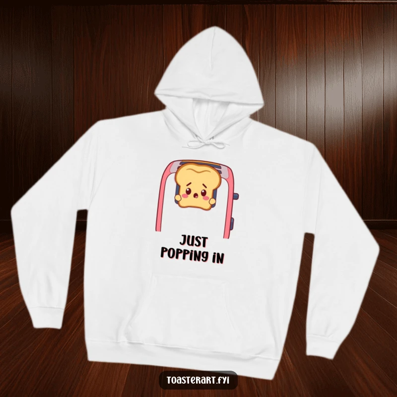 Funny Toast Hoodie: A startled slice of toast peeks from toaster slots, offering cozy surprise and humor.