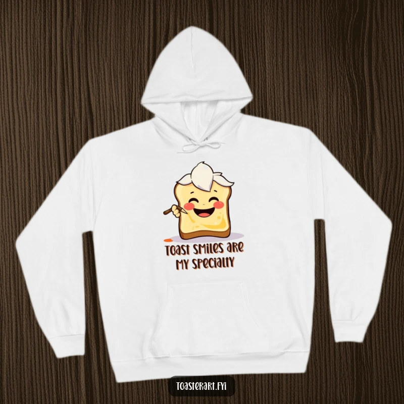 Funny Hoodie featuring a cheerful art brush character painting a smiley face on toast, perfect for comfortable and artistic wear.