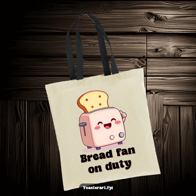 Funny tote bag showing a smiling toaster character fanning steam with a giant bread slice, a humorous kitchen accessory.
